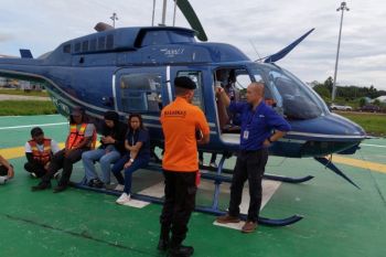 Dua helikopter dikerahkan untuk evakuasi korban kecelakaan heli di Mimika