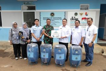 Deputy Minister pushes school meal program as waste management model