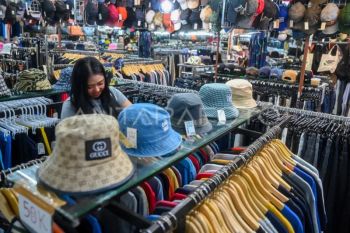 Indonesia warns against buying illegal imported clothing
