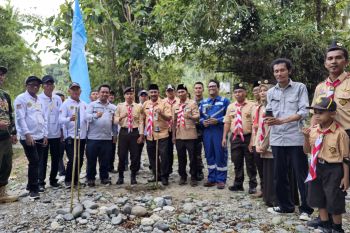 DSLNG dan pramuka kwarran kintom tanam 500 bibit pohon di Babang Buyangge