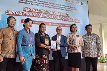 KP2MI launches pocket book for financial education for migrant workers