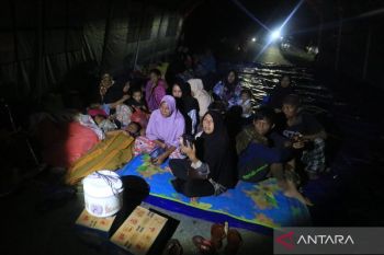 Indonesia races to restore power in flood-hit Aceh  