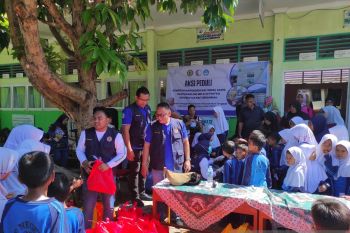 PkM FKG Unbrah, intervensi kesehatan gigi dan mulut terpadu di zona krisis pasca debris flow dan gangguan sanitasi di hulu DAS Padang