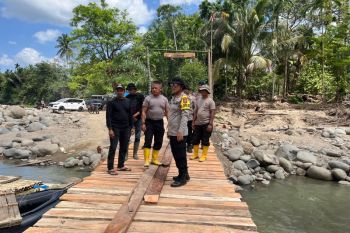 BKO Brimob Kaltim tuntaskan jembatan darurat di Aceh Utara