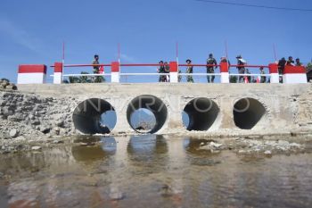 Pembukaan jembatan aramco di Agam