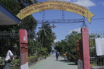 Emas naik tipis di Asia