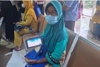 Kisah Ibu Suharti melawan kanker dan penyakit jantung bersama JKN
