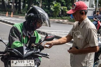 Pemerintah turunkan komisi tarif ojek daring