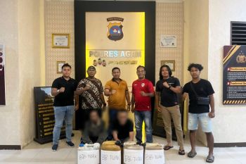 Polres Agam amankan pedagang beserta 35 liter minuman keras
