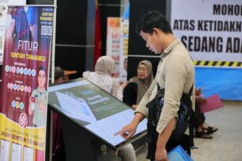 Atur sendiri jadwal kedatangan ke Kantah dengan fitur antrian daring di Sentuh Tanahku