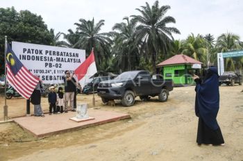 Wisata patok perbatasan Indonesia-Malaysia