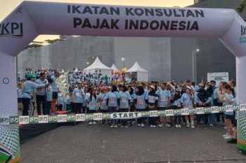 Ikatan Konsultan Pajak Indonesia pecahkan rekor MURI lewat jalan sehat