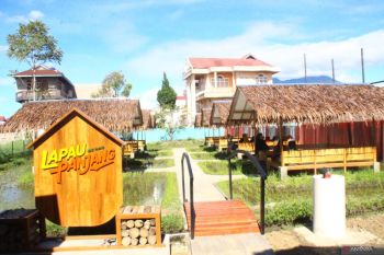 Rumah Makan Lapau Panjang Bukittinggi, hadirkan konsep "Makan Bajamba"