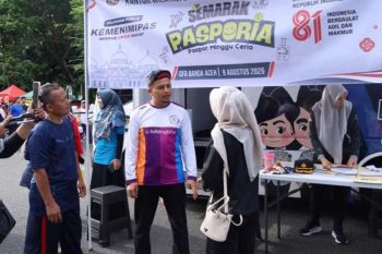Bikin paspor sambil olahraga, Inovasi layanan pasporia Imigrasi Banda Aceh buat CFD makin ceria