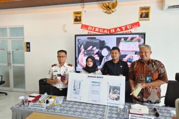 Chinese national detained over alleged credit card theft