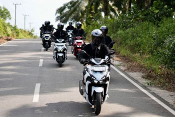 Tips aman dan nyaman berkendara saat terjadi hujan abu vulkanik ala AHM