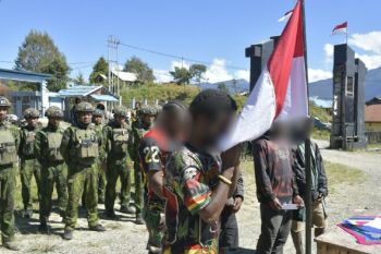 Six armed-group members and supporters pledge allegiance to Indonesia