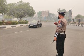 Polisi minta pengendara hidupkan lampu utama di tengah kabut asap
