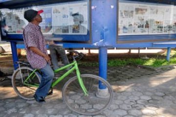 MENUMBUHKAN MINAT BACA