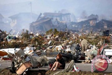 Korban Tewas-hilang Bencana Jepang Hampir 13.000