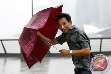 Hujan badai dan gelombang panas akan melanda China
