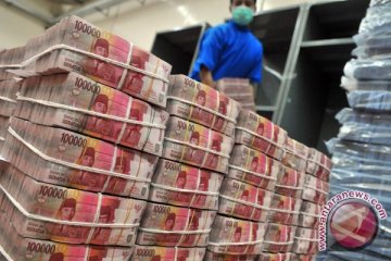 Rupiah tertekan ke level 9.000 per dolar