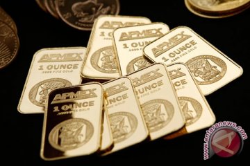 Harga emas naik tipis dan terus menguat setelah pernyataan "dovish" Fed