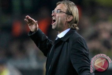 Juergen Klopp merendah