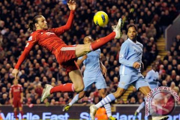 City tolak ide pertukaran Tevez dengan Carroll