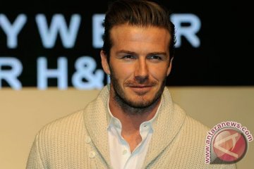David Beckham tidak bisa lepas dari anak