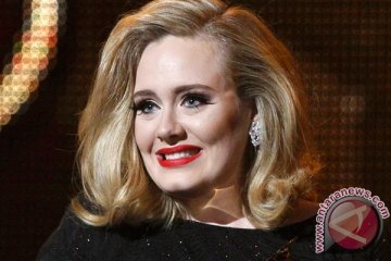 Adele saat konser dedikasikan lagu untuk korban Bom Brussel