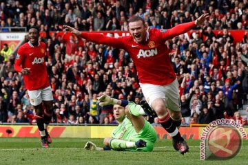 Rooney dekatkan MU ke tangga juara