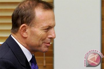 Pengamat: saatnya menentang penggelontoran uang Tony Abbott