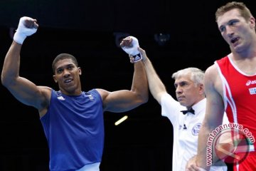 Juara Olimpiade Joshua akan bertarung untuk gelar IBF
