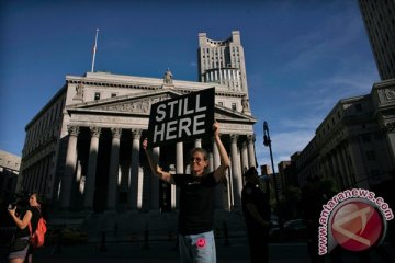 Wall Street bervariasi di tengah pernyataan Fed dan laba Apple