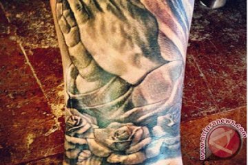 Justin Bieber pamer tato baru