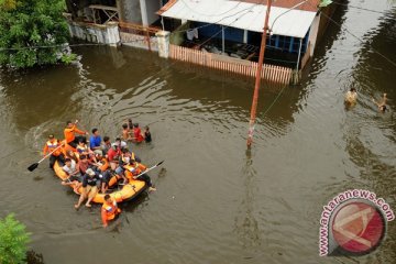 Banjir warnai Misa Natal di Makassar