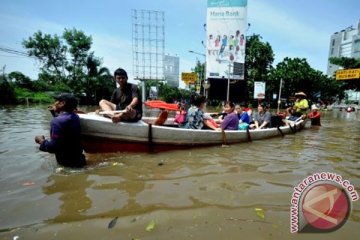 Banjir untungkan tukang ojek Stasiun Manggarai 