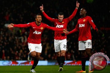 Manchester United menatap sejarah