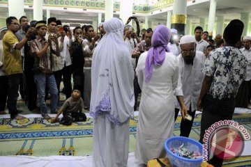 Ratusan warga iringi "mualaf" Ramadhan di Pekanbaru