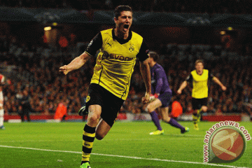Lewandowski antarkan Dortmund ungguli Arsenal
