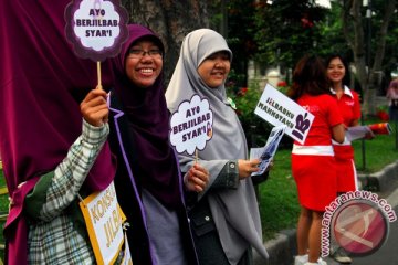 Komunitas SPJ gelar  aksi tebar jilbab