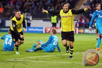 Lewandowski dan Reus antar Dortmund menang di Rusia