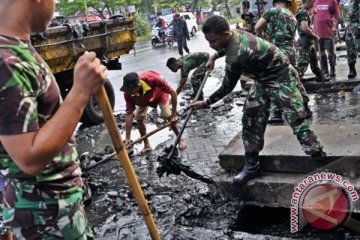 BERSIHKAN DRAINASE