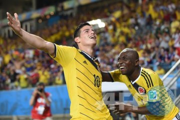 Kolombia pimpin Grup C, disusul Yunani