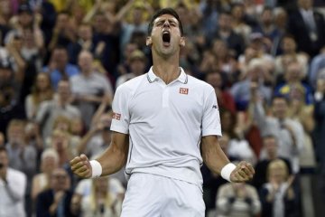 Novak Djokovic melenggang, Marin Cilic nyaris tumbang