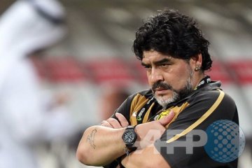 Diego Maradona tampar wartawan