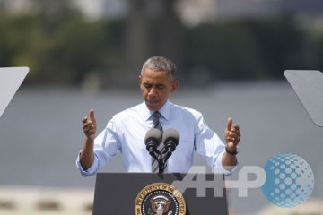Liburan Obama tak berubah setelah serangan udara di Irak