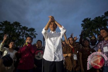 Tim sukses Jokowi-JK syukuran dengan 15 tumpeng