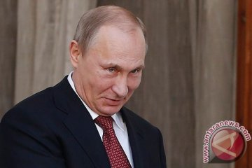 Putin tepis gosip soal ketidakmunculannya